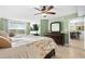 Inviting main bedroom with balcony access and view, featuring dark wood furniture at 2151 Bridge View Ct. # 2502, North Myrtle Beach, SC 29582