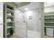 Modern walk-in shower with glass enclosure and open shelving at 2151 Bridge View Ct. # 2502, North Myrtle Beach, SC 29582