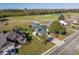 Aerial shot of a home located on a golf course with lush greenery and scenic views at 565 Bucks Trail, Longs, SC 29568
