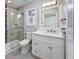 Bathroom featuring a glass shower, white cabinets, and a matching white sink at 565 Bucks Trail, Longs, SC 29568