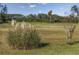 Picturesque view of a golf course with a sand trap and tall grass in the foreground at 565 Bucks Trail, Longs, SC 29568
