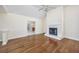 Spacious living room with high ceilings, a fireplace, and hardwood floors at 565 Bucks Trail, Longs, SC 29568