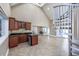 Bright living space with wet bar, granite countertops, and a striking spiral staircase to the upper level at 565 Bucks Trail, Longs, SC 29568