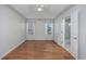 Spacious bedroom featuring tray ceilings, hardwood floors, and a private bathroom at 565 Bucks Trail, Longs, SC 29568