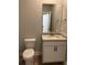 Bathroom features a granite vanity, sink, toilet, and hardware at 1006 Cuttino St., Georgetown, SC 29440
