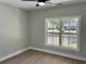 Bright bedroom with hardwood floors and a window view of the outside at 1006 Cuttino St., Georgetown, SC 29440