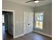 Bedroom showcasing wood floors, closet and view to outside through window at 1006 Cuttino St., Georgetown, SC 29440
