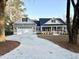 Charming home featuring a concrete driveway leading to an attached two-car garage at 1006 Cuttino St., Georgetown, SC 29440