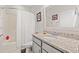Bathroom showcasing a granite countertop, white cabinets, and shower with white curtain at 131 Grissett Lake Dr., Conway, SC 29526