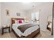 Comfortable bedroom featuring a cozy queen-sized bed with a decorative throw and plush pillows at 131 Grissett Lake Dr., Conway, SC 29526