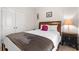 This bedroom offers a cozy queen bed, a nightstand, and double closet for storage at 131 Grissett Lake Dr., Conway, SC 29526