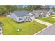 Well-kept home with a lush lawn, stone accents, and a neatly paved driveway at 131 Grissett Lake Dr., Conway, SC 29526