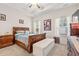 Spacious main bedroom with a tray ceiling, carpet flooring, and large windows at 131 Grissett Lake Dr., Conway, SC 29526