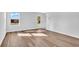 Bright living room with laminate floors and a view to the back yard at 1526 Clubstone Dr., Conway, SC 29526