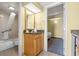 Bright bathroom featuring a granite vanity, mirror, and bathtub with shower at 2311 S Ocean Blvd. # 438, Myrtle Beach, SC 29577