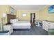Inviting bedroom with a kitchenette, dining table, and two dressers at 2311 S Ocean Blvd. # 438, Myrtle Beach, SC 29577