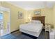 Well-lit bedroom with queen bed and convenient kitchenette access at 2311 S Ocean Blvd. # 438, Myrtle Beach, SC 29577