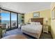 Cozy bedroom with ocean view balcony and comfortable furnishings at 2311 S Ocean Blvd. # 438, Myrtle Beach, SC 29577