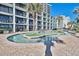 Winding outdoor pool provides a unique design feature, blending seamlessly with nearby accommodations at 2311 S Ocean Blvd. # 438, Myrtle Beach, SC 29577