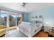 Charming bedroom with light blue walls and balcony access at 4701 N Kings Hwy. # 6, Myrtle Beach, SC 29577