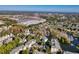 Overhead shot featuring commercial shopping areas, ponds, and residential complexes surrounded by lush trees at 601 Hillside Dr. N # 4133, North Myrtle Beach, SC 29582