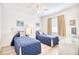 Charming bedroom with two twin beds, nautical decor, and a bright window for a cozy retreat at 601 Hillside Dr. N # 4133, North Myrtle Beach, SC 29582