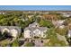 Exterior aerial view of a multi-story complex displaying multiple balconies, landscaping, and parking at 601 Hillside Dr. N # 4133, North Myrtle Beach, SC 29582