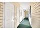 Hallway with multiple doors leading to condo units at 601 Hillside Dr. N # 4133, North Myrtle Beach, SC 29582