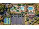 Stunning aerial view of community pools, tennis courts, and the clubhouse at 656 Pistoia Ln. # 304, Myrtle Beach, SC 29579