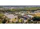 Enjoy the resort community with pool and tennis courts from this aerial view of the homes at 656 Pistoia Ln. # 304, Myrtle Beach, SC 29579