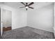 Serene bedroom with neutral carpet, a ceiling fan, and a door to a closet at 656 Pistoia Ln. # 304, Myrtle Beach, SC 29579
