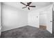 Cozy bedroom with soft carpet, a ceiling fan, and a doorway, providing a comfortable retreat at 656 Pistoia Ln. # 304, Myrtle Beach, SC 29579