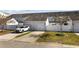 Rear view of a townhouse with attached garage and driveway, great parking at 656 Pistoia Ln. # 304, Myrtle Beach, SC 29579