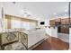 Open concept living room into kitchen with lots of natural light, and modern decor at 656 Pistoia Ln. # 304, Myrtle Beach, SC 29579