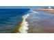 Oceanfront beach with waves and people enjoying the sun at 870 Ocean Blvd., Holden Beach, NC 28462