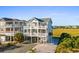 Two-story home with balconies and marsh views at 870 Ocean Blvd., Holden Beach, NC 28462