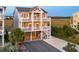 Two-story beach home with elevated deck and ocean views at 870 Ocean Blvd., Holden Beach, NC 28462