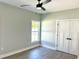 Bedroom features a ceiling fan, and a window with green yard views at 909 Grimes St., Georgetown, SC 29440