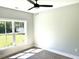A cozy bedroom with a window with views of the greenery outside at 909 Grimes St., Georgetown, SC 29440