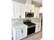 Kitchen features stainless steel appliances and white countertops at 909 Grimes St., Georgetown, SC 29440