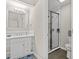 Updated bathroom with white vanity, walk-in shower, and modern fixtures at 23 Shadow Moss Pl. # 23, North Myrtle Beach, SC 29582