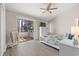 Main bedroom with a king-size bed, sliding glass doors to a private deck and plenty of natural light at 23 Shadow Moss Pl. # 23, North Myrtle Beach, SC 29582