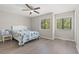 Bright bedroom with light flooring and a queen-size bed at 23 Shadow Moss Pl. # 23, North Myrtle Beach, SC 29582