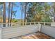 Private deck overlooking a pond and lush trees at 23 Shadow Moss Pl. # 23, North Myrtle Beach, SC 29582