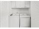 Laundry closet with side-by-side washer and dryer at 23 Shadow Moss Pl. # 23, North Myrtle Beach, SC 29582