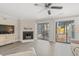 Living room features hardwood floors, fireplace, and sliding glass doors to a private patio at 23 Shadow Moss Pl. # 23, North Myrtle Beach, SC 29582