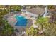 Community pool with lounge chairs and a pergola at 23 Shadow Moss Pl. # 23, North Myrtle Beach, SC 29582
