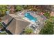 Community pool with surrounding lounge area at 23 Shadow Moss Pl. # 23, North Myrtle Beach, SC 29582