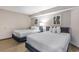Bright bedroom showcasing two queen beds and neutral wall colors at 2301 S Ocean Blvd. # 1408, North Myrtle Beach, SC 29582