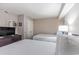 Well-furnished bedroom equipped with two beds, dresser, and decorative mirror at 2301 S Ocean Blvd. # 1408, North Myrtle Beach, SC 29582